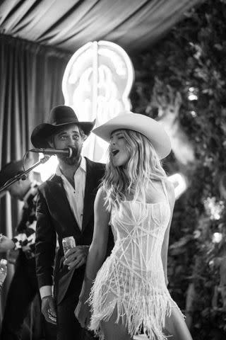 <p>The Brothers Martens</p> Ryan Bingham and Hassie Harrison on their wedding night