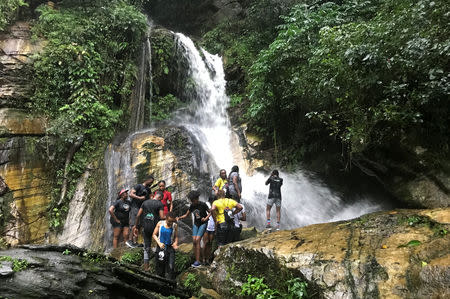 Tourists are seen gathered at the waterfall in Ikogosi Warm Springs in Ekiti, Ekiti State, Nigeria November 10, 2018. Picture taken November 10, 2018. REUTERS/Seun Sanni