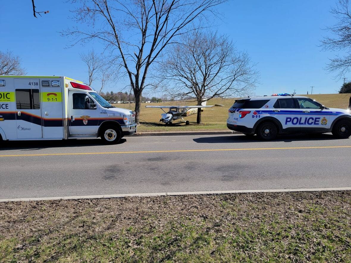 A plane crashed near Paul Benoit Drive and Hunt Club Road on Sunday. Paramedics said one person was treated and released on the scene.  (Submitted by Mike Morin - image credit)