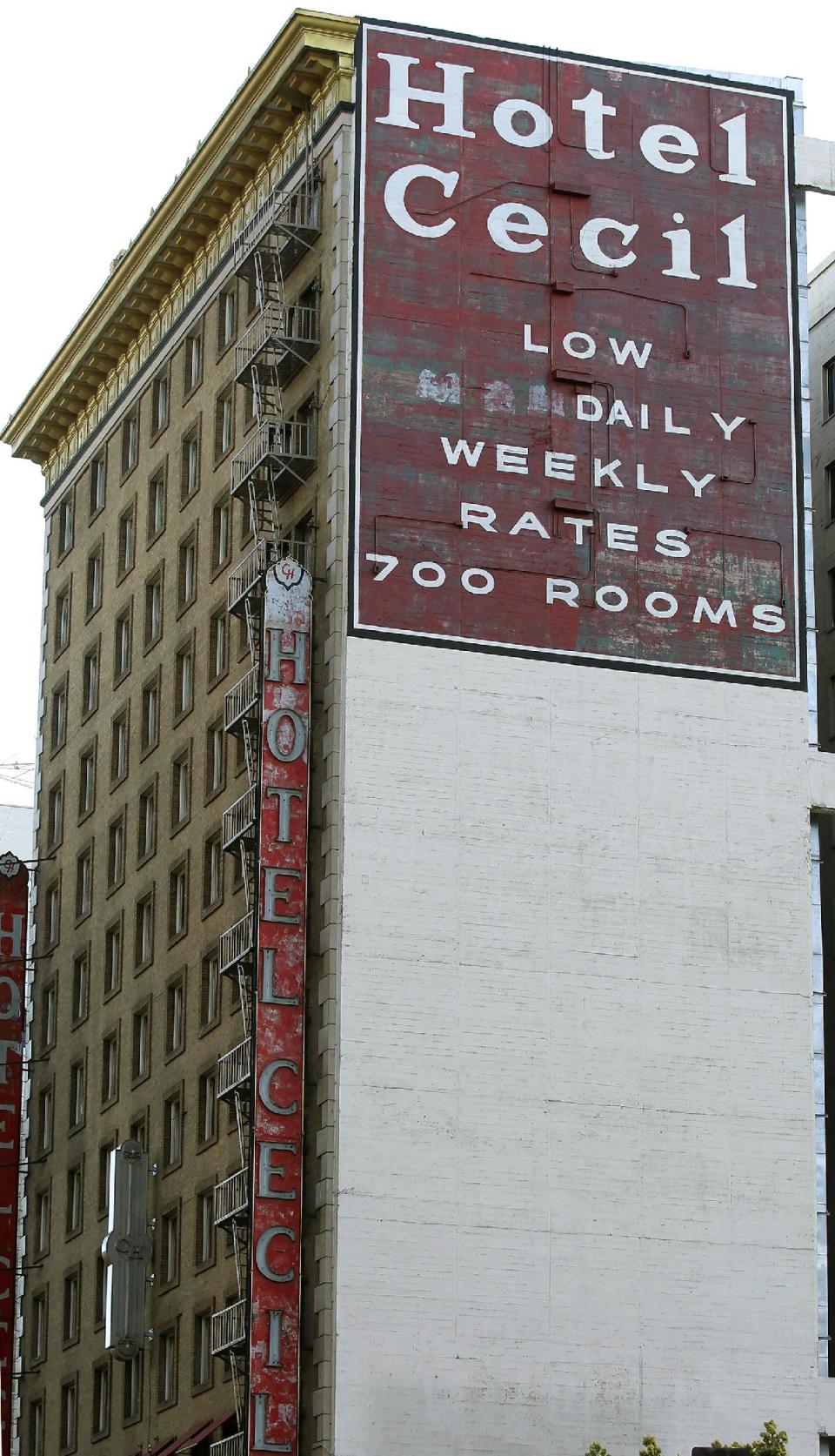 FILE - Hotel Cecil in Los Angeles is seen in a Wednesday Feb. 20, 2013 file photo. Police say the body of a missing Canadian woman was found Tuesday at the bottom of one of four cisterns on the roof of the hotel. The tanks provide water for hotel taps and would have been used by guests for washing and drinking. Los Angeles County Department of Public Health officials were expected to release the results of tests on the water on Thursday, Feb. 21. Investigators used body markings to identify 21-year-old Elisa Lam, police spokeswoman Officer Diana Figueroa said late Tuesday. (AP Photo/Nick Ut, File)