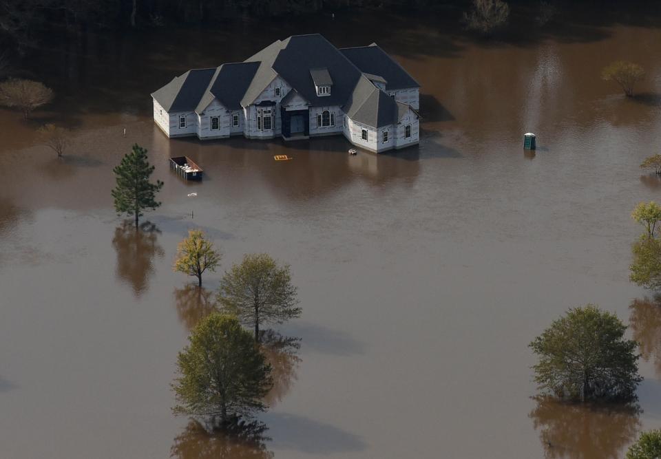 Flood waters from the Neuse River surround parts of Kinston, N.C. Friday Oct. 14, 2016 after Hurricane Matthew. KEN BLEVINS/STARNEWS