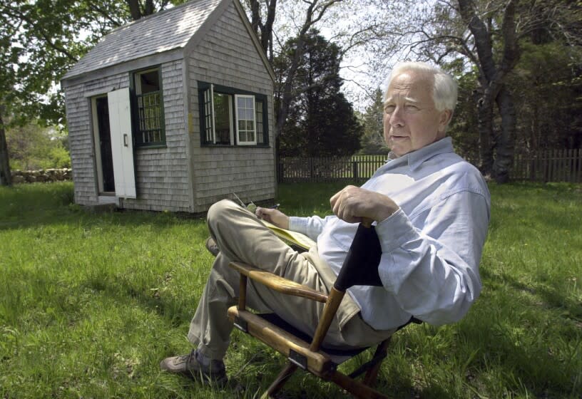 FILE - Writer and historian David McCullough appears at his Martha's Vineyard home in West Tisbury, Mass., on May 12, 2001. McCullough, the Pulitzer Prize-winning author whose lovingly crafted narratives on subjects ranging from the Brooklyn Bridge to Presidents John Adams and Harry Truman made him among the most popular and influential historians of his time, died Sunday in Hingham, Massachusetts. He was 89. (AP Photo/Steven Senne, File)