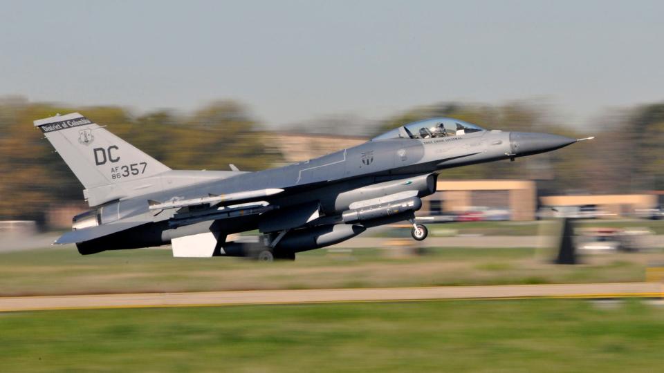 In this file photo, an F-16 Fighting aircraft returns from a training mission at Joint Base Andrews, Md.
