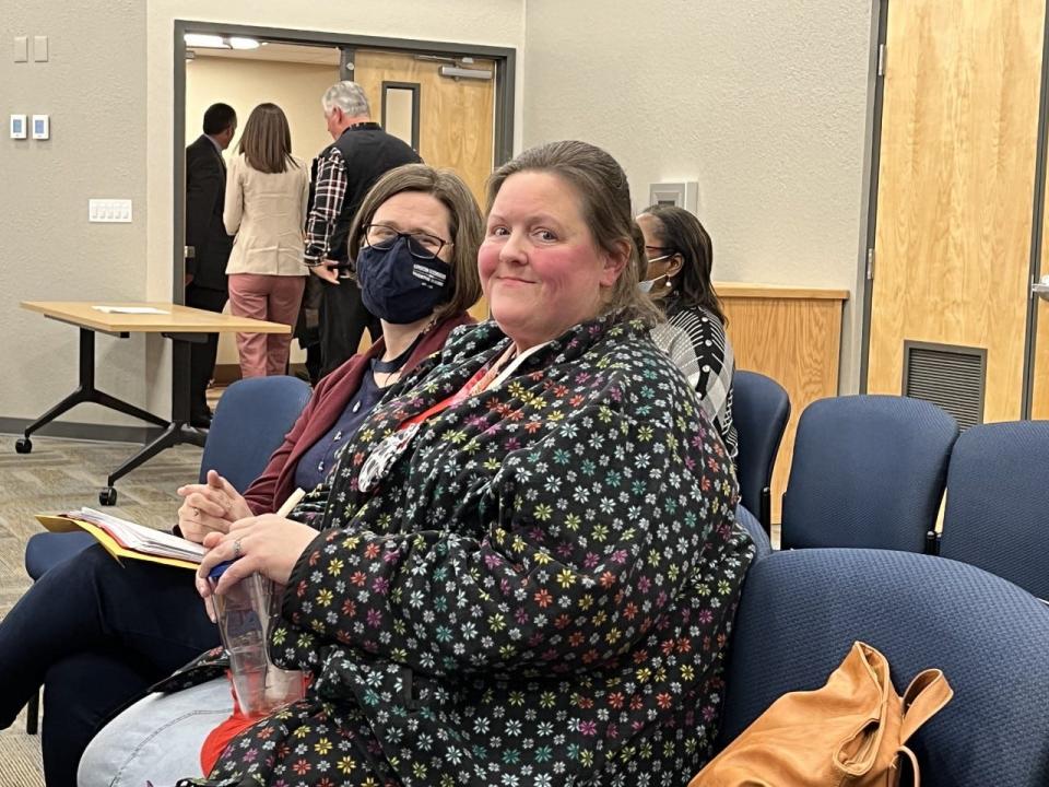 Cheryl Ziegler, an Escambia High School earth and space, science and biology teacher, smiles after speaking before the Escambia County School Board about the need for pay raises for veteran educators.