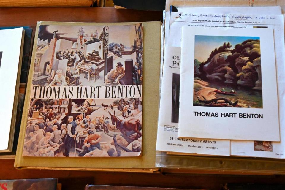 Fred McCraw, 91, a friend of the late artist Thomas Hart Benton, keeps several books on Benton at his home in Johnson County.
