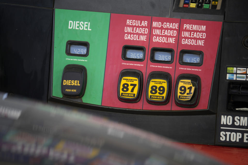 The prices of the various grades of gasoline available are displayed electronically on a pump at a filling station Monday, Sept. 18, 2023, in Newcastle, Wyo. (AP Photo/David Zalubowski)