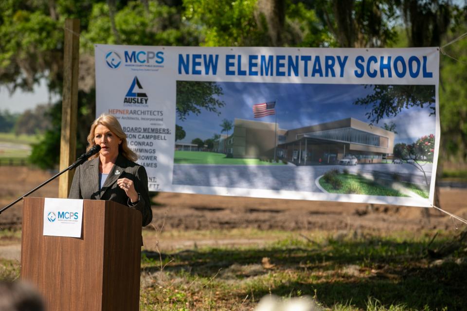 School Superintendent Diane Gullett speaks on Thursday during a groundbreaking ceremony for a new elementary school at Winding Oaks Farm in southwest Ocala.