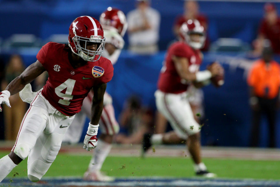 MIAMI GARDENS, FL - DECEMBER 29: Alabama Crimson Tide wide receiver Jerry Jeudy (4) runs a route as quarterback Tua Tagovailoa (13) makes the throw against the Oklahoma Sooners during the third quarter of the CFP Semifinal at the Orange Bowl on December 29, 2018 at Hard Rock Stadium in Miami Gardens, Florida. Alabama defeated Oklahoma 45-34. (Photo by Douglas Jones/Icon Sportswire via Getty Images)