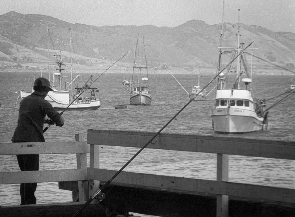 Fishing at Port San Luis continues despite the changed conditions due to a tropical weather system called El Niño. June 27, 1983.