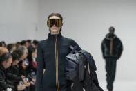 A model wears a creation as part of the men's K-Way Fall-Winter 2024-2025 collection, that was presented in Milan, Italy, Sunday, Jan. 14, 2024. (AP Photo/Antonio Calanni).