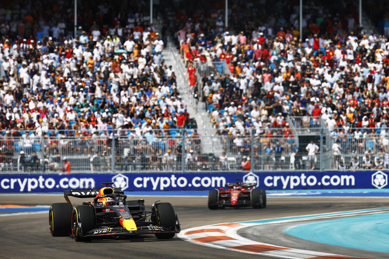 MIAMI, FLORIDA - MAY 08: Max Verstappen of the Netherlands driving the (1) Oracle Red Bull Racing RB18 leads Charles Leclerc of Monaco driving (16) the Ferrari F1-75 during the Formula 1 Grand Prix of Miami at the Miami International Autodrome on May 08, 2022 in Miami, Florida. (Photo by Jared C. Tilton/Getty Images)