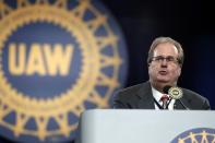 FILE - In this March 11, 2019 file photo, Gary Jones, president of the United Auto Workers union addresses delegates to the union's bargaining convention in Detroit. In recent years, Detroit automakers have been at relative peace with the UAW union because times have been good and profit-sharing checks have been fat. That all could change this week when talks open Monday, July 15 on new four-year contracts with the union representing 142,000 workers across the nation. Auto companies want to cut labor costs and end a gap with those at foreign-owned factories in the U.S. At bargaining convention in March, Jones told delegates that the union is raising strike pay and said the union would walk out if necessary. (AP Photo/Carlos Osorio, File)