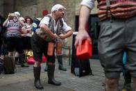 Monty Python fans dressed as the Gumbys gather in an attempt to set the world record for the largest gathering of people dressed as Gumbys as a part of the 50th anniversary of Monty Python's Flying Circus at the Roundhouse in London