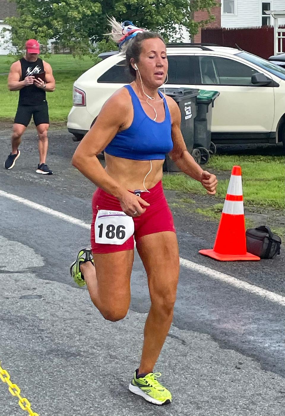 Tiffany Leventhal of Honesdale cruises home as the women's top finisher at the 2023 Firecracker 5K.