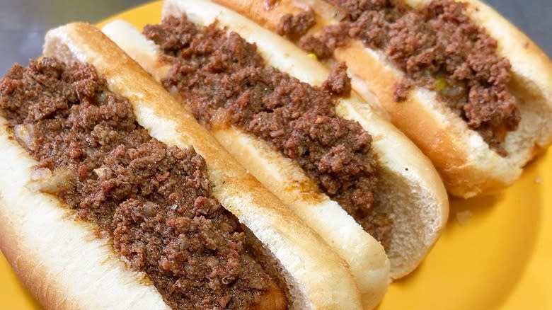 Hot dogs on plate with chili
