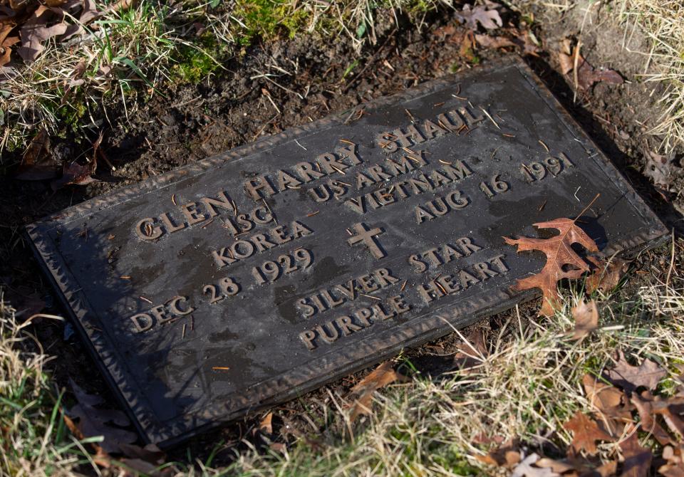 Peter Sztybel and his dog Whiskey, a 16-year-old Red Miniature Pinscher, seek out hidden, overgrown graves of military veterans and spruce them up. They are working in the Whiting Cemetery on this particular day.   Manchester, NJWednesday, January 12, 2022 