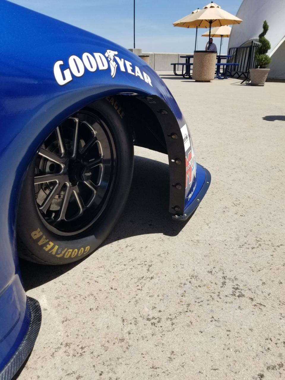 <p>Yes, there is some irony in the Funny Car's needle-shaped body and Dodge's "widebody" graphics mimicking the production <a href="https://www.caranddriver.com/news/a28209074/2020-dodge-charger-scat-pack-hellcat-widebody-photos-info/" rel="nofollow noopener" target="_blank" data-ylk="slk:Charger SRT Hellcat Widebody;elm:context_link;itc:0;sec:content-canvas" class="link ">Charger SRT Hellcat Widebody</a>'s wide-track design. Try not to think too hard about it. </p>