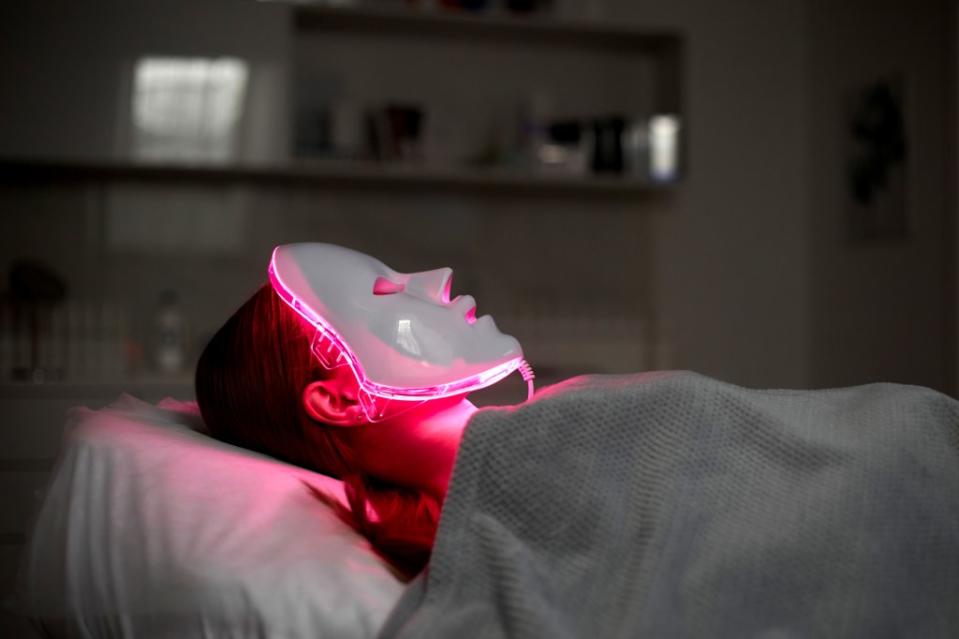 It might look odd, but red light therapy masks can minimize wrinkles, diminish acne and even fade scars. Getty Images