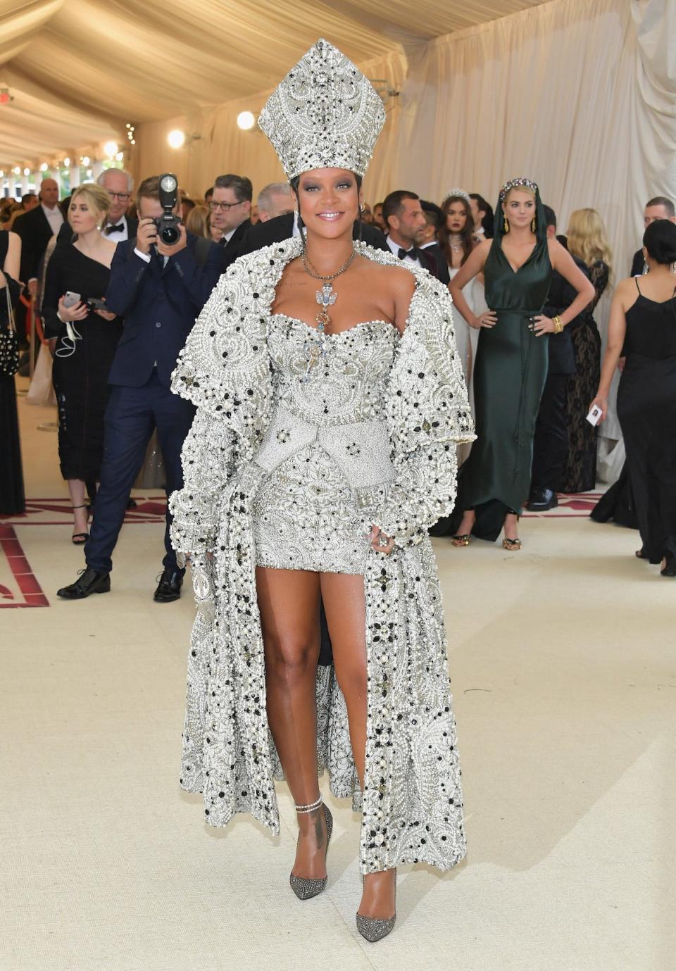 Rihanna wearing a silver look for the heavenly bodies Met Gala in 2018