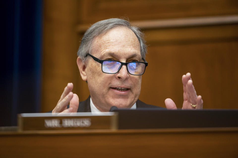 FILE - Rep. Andy Biggs, R-Ariz., speaks during a House Oversight and Government Reform Committee hearing on Capitol Hill in Washington, Oct. 7, 2021. This year’s $1 trillion infrastructure bill easily cleared the Senate by a 69-13 vote with some GOP support. But the bill crawled through the House last week by a 228-206 margin with just 13 Republican votes. Those 13 GOP members have come under harsh criticism from former President Donald Trump and others. (Bill Clark/Pool via AP, File)