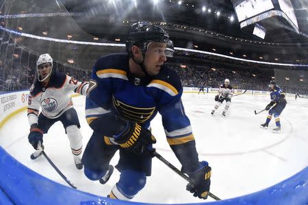 Mar 19, 2019; St. Louis, MO, USA; St. Louis Blues left wing Jaden Schwartz (17) skates with the puck as Edmonton Oilers defenseman Darnell Nurse (25) defends during the third period at Enterprise Center. Mandatory Credit: Jeff Curry-USA TODAY Sports