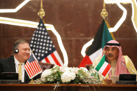 U.S. Secretary of State Mike Pompeo and Kuwait's Foreign Minister Sheikh Sabah Al-Khalid Al-Sabah speak during a news conference in Kuwait City, Kuwait March 20, 2019. REUTERS/Jim Young/Pool