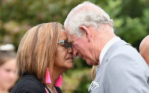 Prince Charles receives a traditional Maori greeting - Credit: Kai Schwoerer/Getty Images