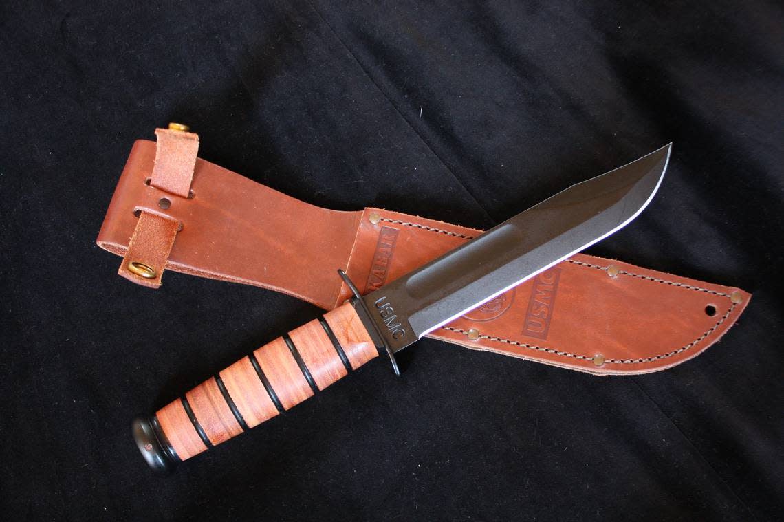 A KA-BAR brand combat-style knife.