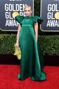 <p>Jodie Comer took a page out of <a href="https://www.townandcountrymag.com/leisure/arts-and-culture/g26557111/killing-eve-best-costumes/" rel="nofollow noopener" target="_blank" data-ylk="slk:Villanelle's book;elm:context_link;itc:0;sec:content-canvas" class="link ">Villanelle's book</a> by choosing a a-line emerald gown with statement sleeves. </p>