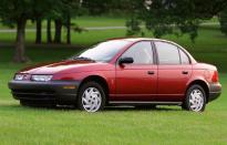 <p>Part of the <strong>General Motors </strong>family, the Saturn S-Series was notable for its extended proboscis front end that hinted at sporting prowess. That was unlikely with the <strong>1.9-litre </strong>engine used in the first generation, but it did stand out for using plastic body panels hung from a spaceframe-style chassis.</p><p>Saturn also turned out <strong>450 </strong>right-hand drive versions in 1999 specifically for the United States Postal Service so the driver could exit on the kerbside for deliveries. Saturn was closed down in 2010 during GM’s restructuring following the financial crisis.</p>