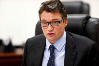 Minister Konrad Mizzi addresses a news conference in Valletta, Malta, July 18, 2013. Picture taken July 18, 2013. REUTERS/Darrin Zammit Lupi