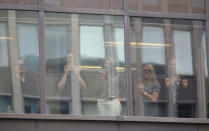 <p>Office workers look on from a building next to the Labour Party’s Headquarters in London, Britain June 9, 2017. (Photo: Marko Djurica/Reuters) </p>
