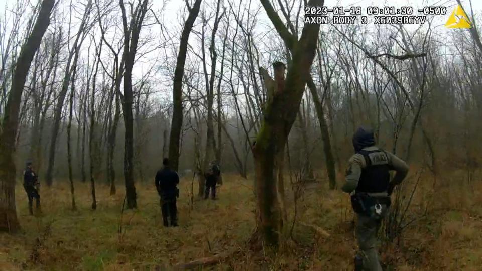 In this image taken from body cam video released by the Atlanta Police Department, officers respond to gunfire in the distance near the future site of City of Atlanta’s Public Safety Training Center (Atlanta Police Department)
