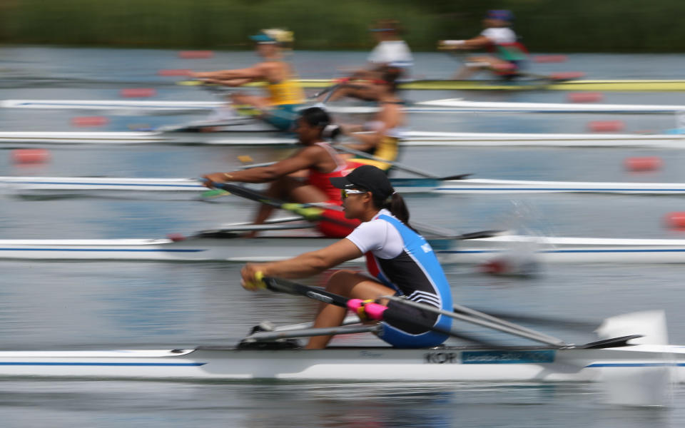 Yeji Kim of Republic of Korea competes in the Women's Single Sculls Heat 2 on Day 1 of the London 2012 Olympic Games at Eton Dorney on July 28, 2012 in Windsor, England. (Photo by Streeter Lecka/Getty Images)