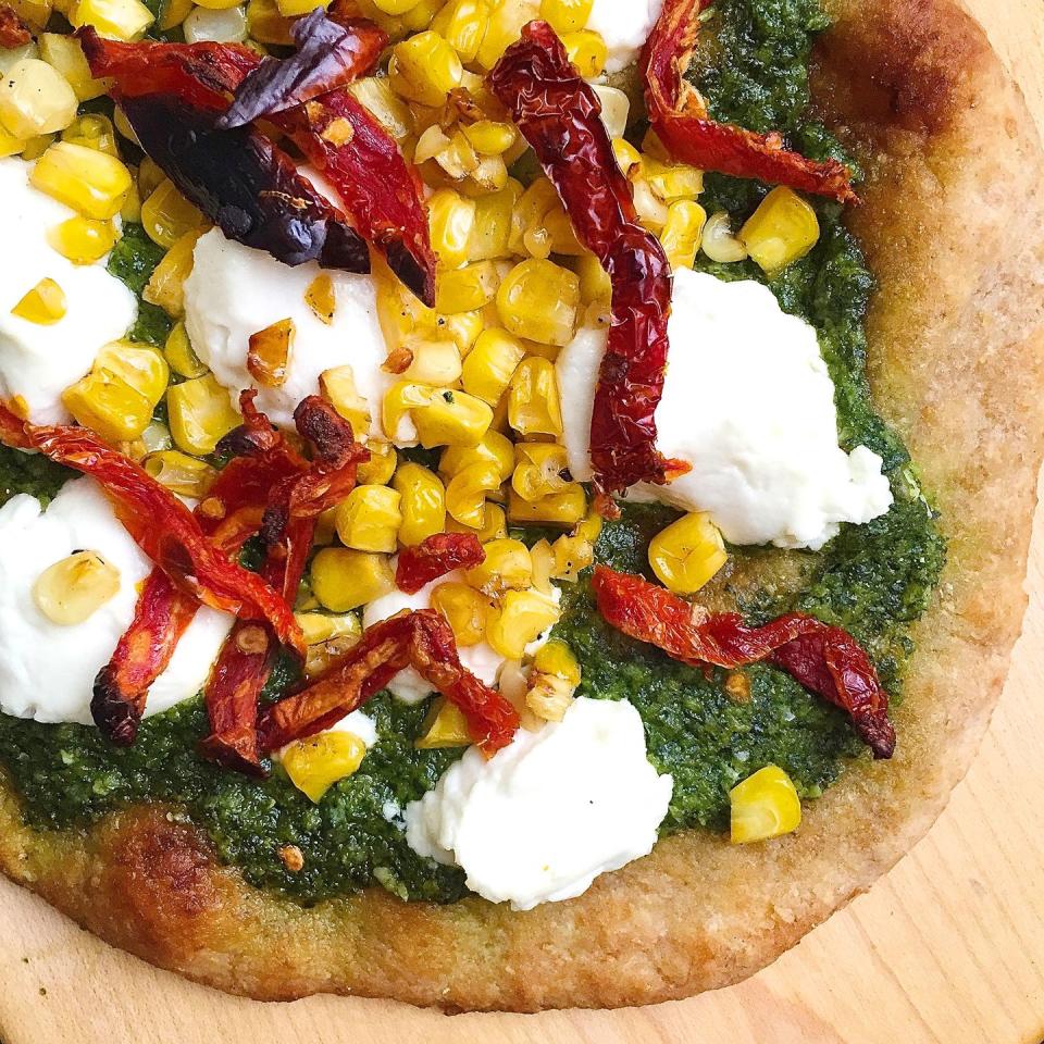 Flatbread Pizzas with Pesto, Corn, Goat Cheese, and Sundried Tomatoes