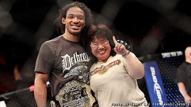 Benson Henderson smiles for the camera with his mom after beating Nate Diaz 50-43, 50-45, 50-45 in their five-round bout. (Credit: Tracy Lee for Yahoo! Sports)