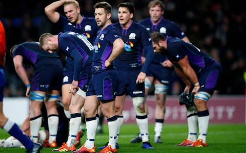 Greig Laidlaw of Scotland reacts after George Ford of England scores a try at Twickenham Stadium - Credit: GETTY IMAGES