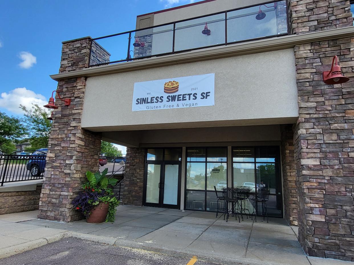 A temporary banner sits ready for the opening day of Sinless Sweets, a gluten free and vegan bakery and restaurant at 5009 S. Western Avenue in Sioux Falls. The storefront opens Thursday, September 8, at 9 a.m.