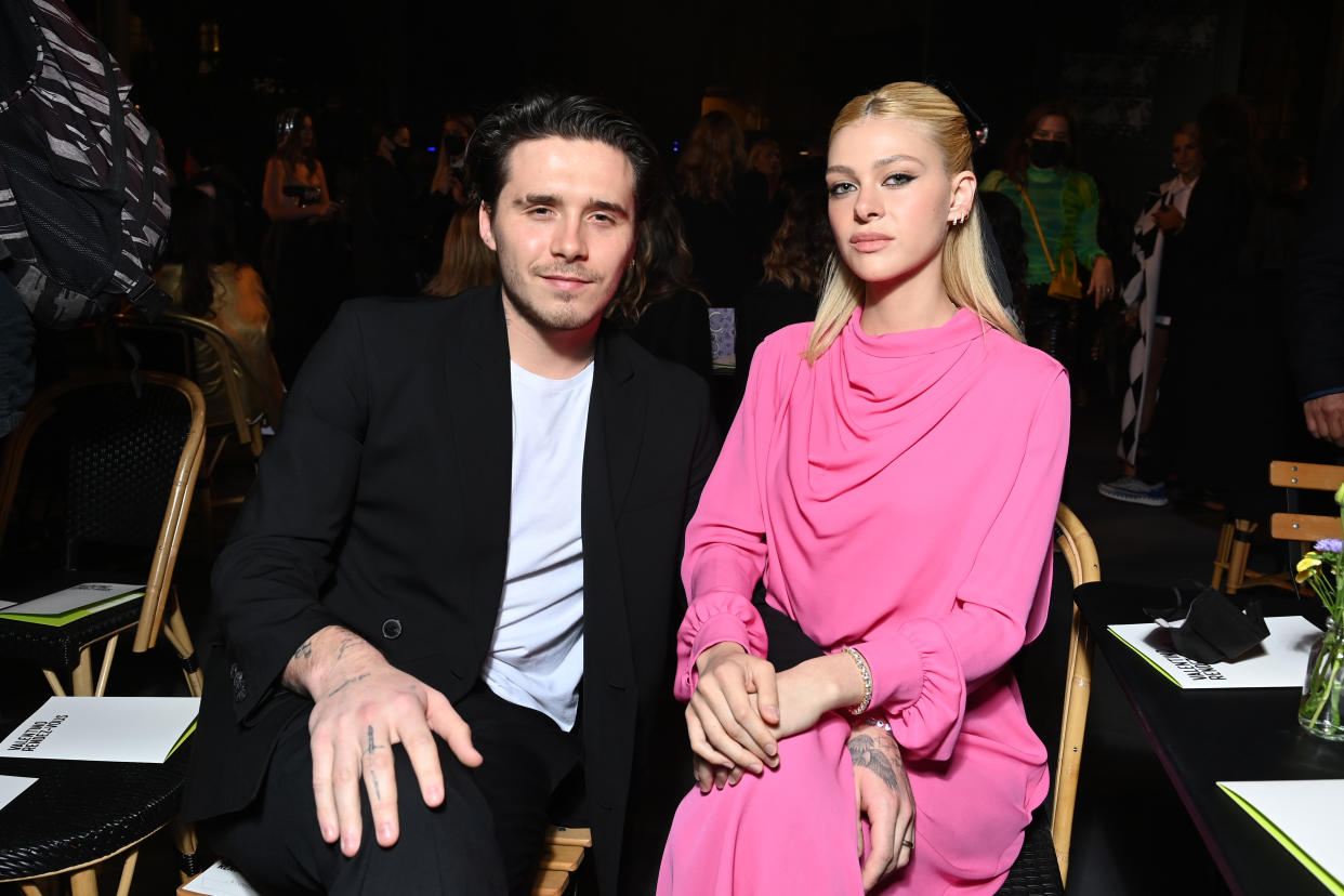 Brooklyn Beckham and Nicola Peltz attend the Valentino Womenswear Spring/Summer 2022 show as part of Paris Fashion Week on October 01, 2021 in Paris, France. (Getty Images)