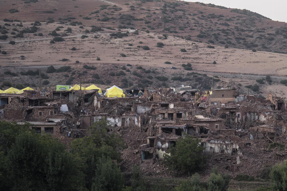 A view of the damage which was caused by the earthquake to a village, outside Marrakech, Morocco, Wednesday, Sept. 13, 2023. An aftershock rattled central Morocco on Wednesday, striking fear into rescue crews at work in High Atlas villages, digging people out from rubble that could slide. (AP Photo/Mosa'ab Elshamy)