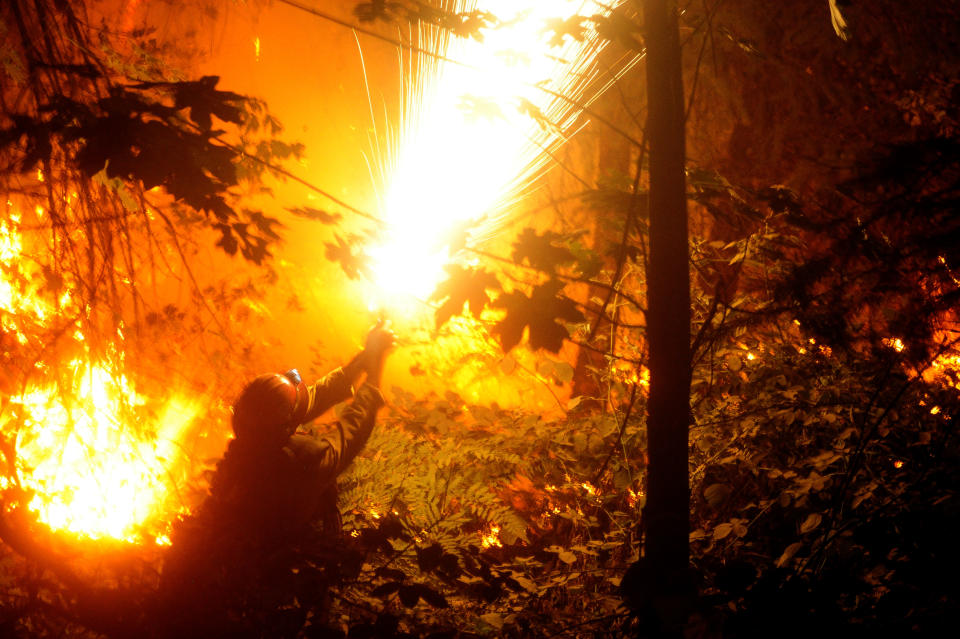 Northern California wildfire surges