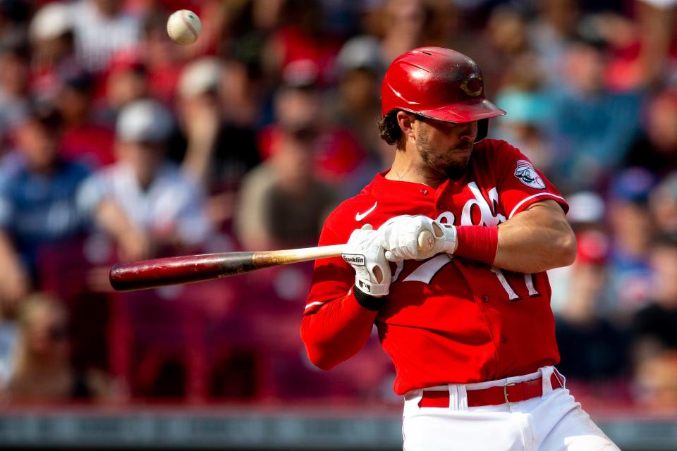 Cincinnati Reds shortstop Kyle Farmer (17) is hit by a pitch in the fifth inning of the MLB game between the Cincinnati Reds and the Atlanta Braves at Great American Ball Park in Cincinnati on Saturday, July 2, 2022.