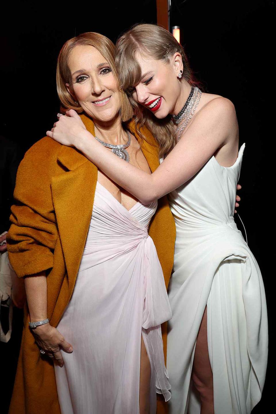 <p>Kevin Mazur/Getty</p> Céline Dion and Taylor Swift hug at the 66th GRAMMY Awards at Crypto.com Arena on Feb. 4, 2024 in Los Angeles