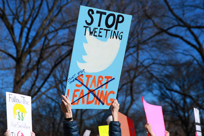 <p>A protester hold up a sign addressing President Trump’s “abuse” of his Twitter account at a “Not My President’s Day” rally on Central Park West in New York, Feb. 20, 2017. (Gordon Donovan/Yahoo News) </p>