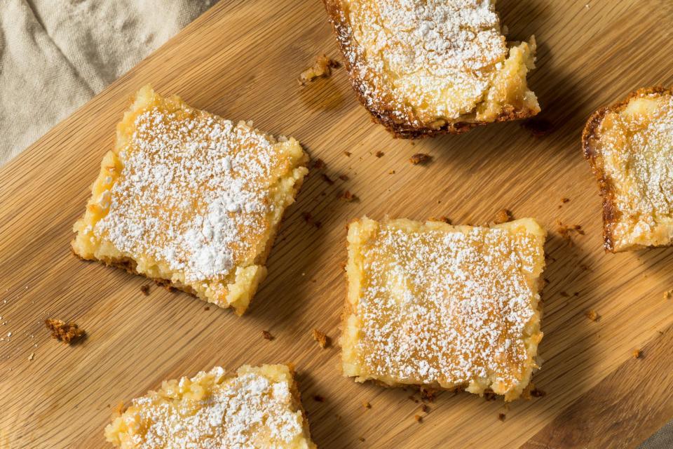 <p>Head to St. Louis and you’ll find one of the most fittingly-named foods around — <a href="https://www.thedailymeal.com/recipes/gooey-butter-cake?referrer=yahoo&category=beauty_food&include_utm=1&utm_medium=referral&utm_source=yahoo&utm_campaign=feed" rel="nofollow noopener" target="_blank" data-ylk="slk:gooey butter cake;elm:context_link;itc:0;sec:content-canvas" class="link ">gooey butter cake</a>. The flat, dense cake originated in the 1930s and is a mixture of flour, butter, sugar and eggs. This sweet treat is baked and dusted with powdered sugar to create a <a href="https://www.thedailymeal.com/easy-dessert-recipes-five-ingredients-fewer?referrer=yahoo&category=beauty_food&include_utm=1&utm_medium=referral&utm_source=yahoo&utm_campaign=feed" rel="nofollow noopener" target="_blank" data-ylk="slk:dessert that's easy to make with just a few ingredients.;elm:context_link;itc:0;sec:content-canvas" class="link ">dessert that's easy to make with just a few ingredients.</a></p>