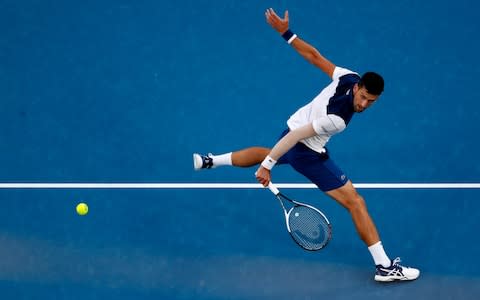 Serbia's Novak Djokovic makes backhand return to South Korea's Chung Hyeon during their fourth round match at the Australian Open tennis championships in Melbourne, Australia, Monday, Jan. 22, 2018 - Credit: AP