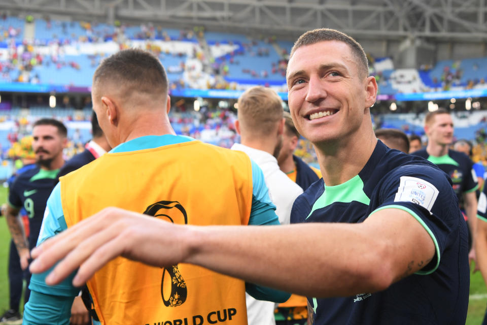 Mitch Duke, pictured here celebrating with teammates after the Socceroos' win over Tunisia.