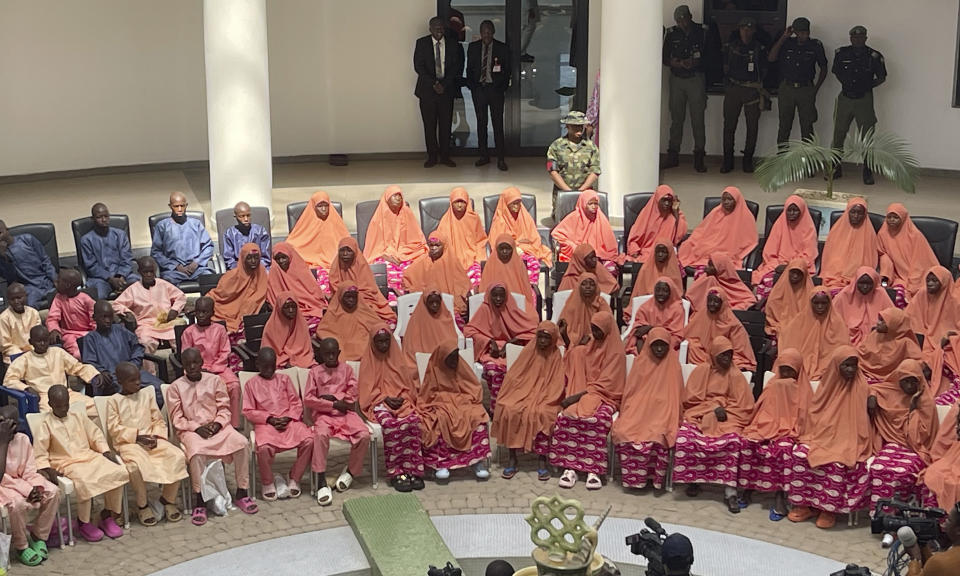 Freed students of the LEA Primary and Secondary School Kuriga, upon arrival at the government house in Kaduna, Nigeria, Monday, March 25, 2024. More than 130 children abducted more than two weeks ago from their school in Nigeria's northwestern state of Kaduna were rescued Sunday and are getting psychological support before being returned to their families, the West African nation’s military and government officials said. (AP Photo/Chinedu Asadu)