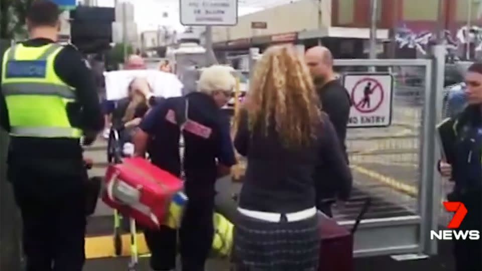 A man brandishing a knife allegedly pushed four women on to the tracks in Melbourne. Photo: 7 News