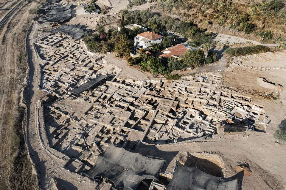 An aerial picture taken by a drone shows a massive ancient winemaking complex dating back some 1,500 years in Yavne, south of Tel Aviv, Israel, Monday, Oct. 11, 2021. Israeli archaeologists said the complex includes five wine presses, warehouses, kilns for producing clay storage vessels and tens of thousands of fragments and jars. (AP Photo/Tsafrir Abayov)